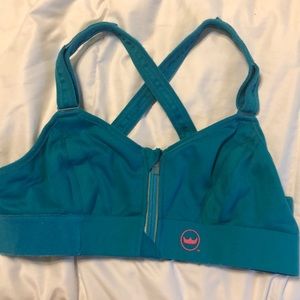 SheFit sports bra, size Medium in the color teal